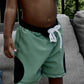 The Eclipse Swim Trunks